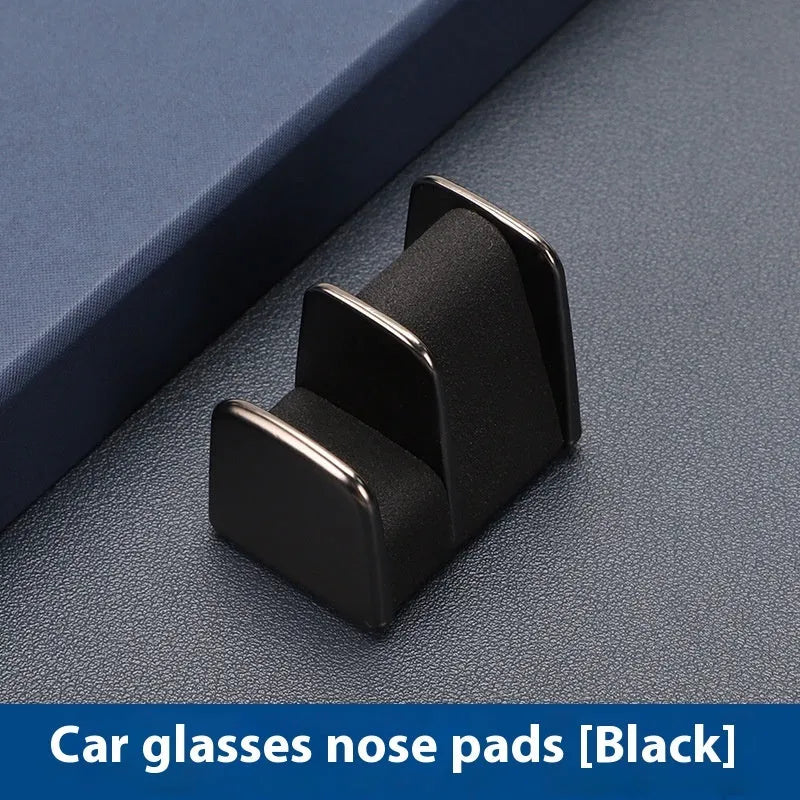 Car dashboard glasses holder clip in leather-covered zinc alloy, showing colour options