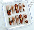 Nail art kit with bottle of jelly glue, rubbing strip, and sheet of nail patches in SGJ-A2-0026 colour.