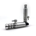 Pair of oil control VVT solenoid valves for Buick and Chevrolet vehicles on a white background.