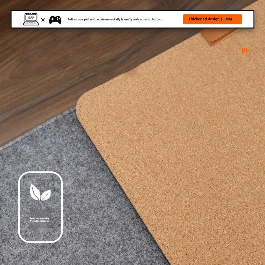 Oversized grey felt cork desk mat with non-slip backing shown on office desk