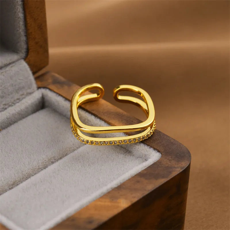 Korean women's open geometric ring with electroplated gold finish on copper