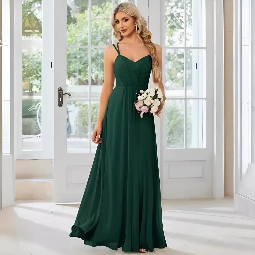 Women's long sleeveless A-line pleated dress in light green for banquet or casual wear.