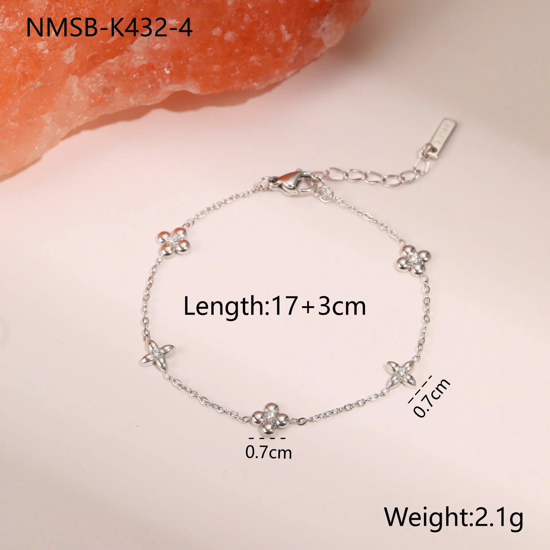 Ins Titanium Steel women's bracelet with 18K gold plating and a geometric zircon star pendant.