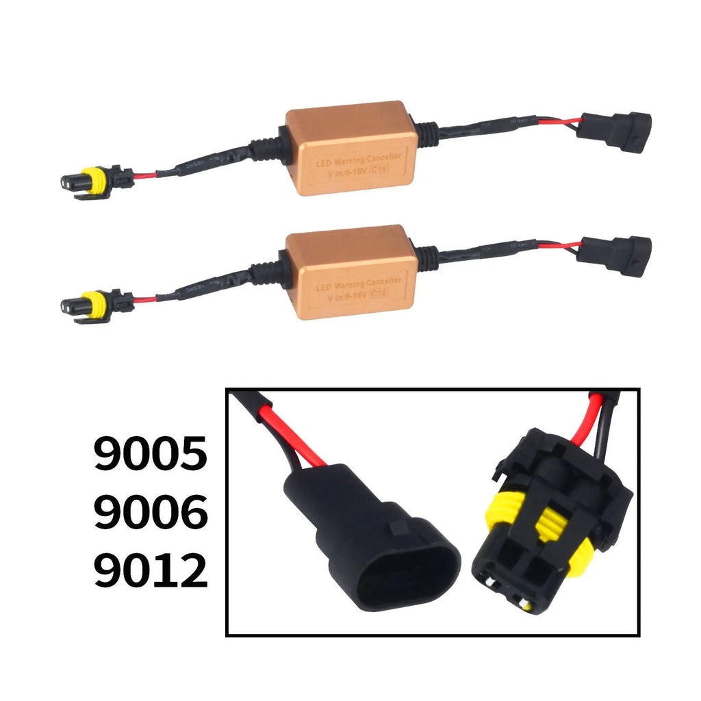 Black alloy LED Canbus decoder for H4 H7 H11 car headlight bulbs on a white background.
