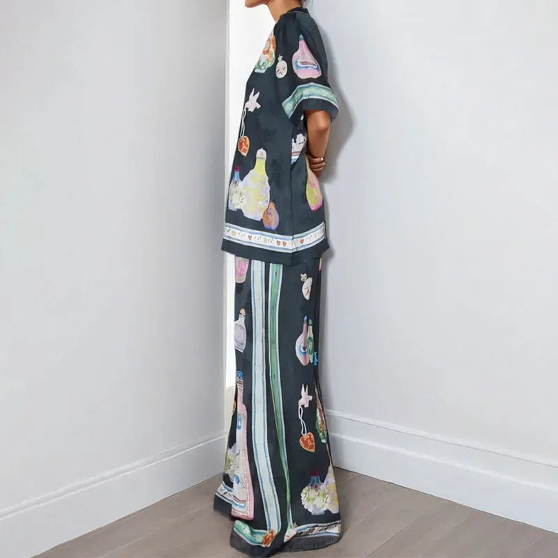 Black women's casual two-piece set with cartoon pattern cardigan and plain trousers
