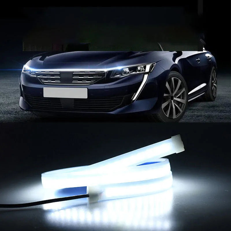 Flexible PVC LED light strip for automotive engine bay, showing white illumination through a car grille.