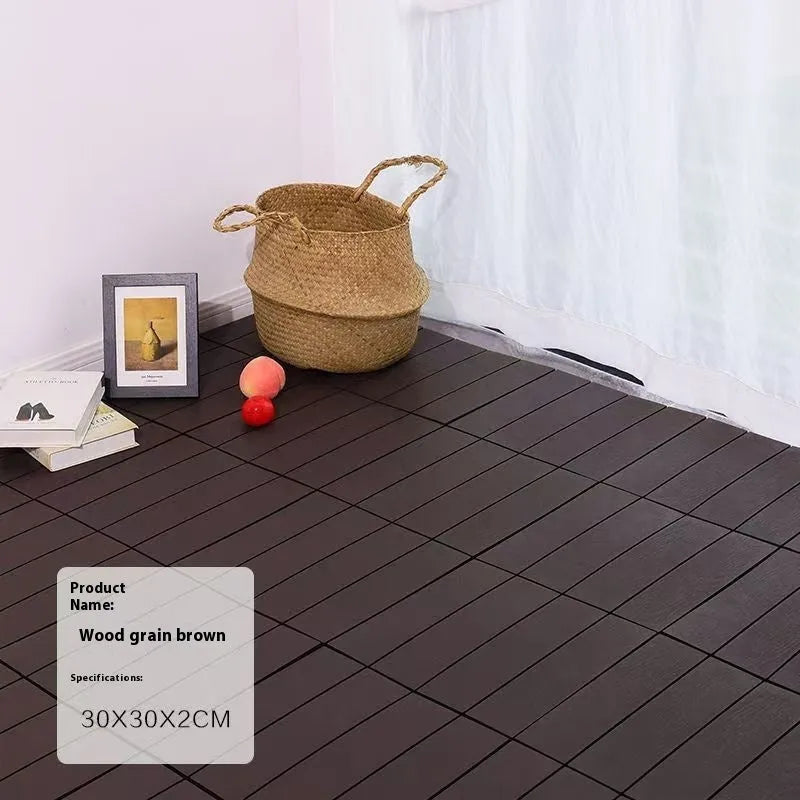 Pack of ten wood grain plastic interlocking floor tiles showing splicing edges.