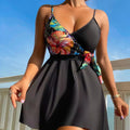 Women's black high waist briefs with split bikini construction and printed design for swimming and sports