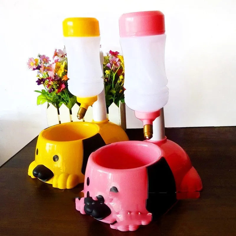 Pink adjustable height pet drinking bowl on a rod-lifting stand