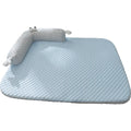 Blue pet bed cushion with cartoon monster face, showing non-slip base and folded size.