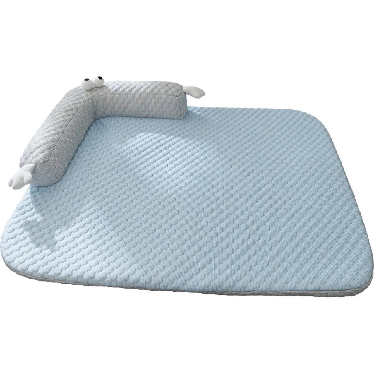 Blue pet bed cushion with cartoon monster face, showing non-slip base and folded size.