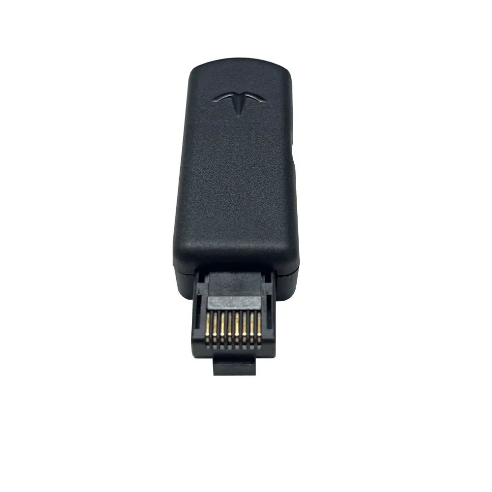 Black JB Tool USB host adapter for PlayStation with Ethernet port, shown with data cable and manual.