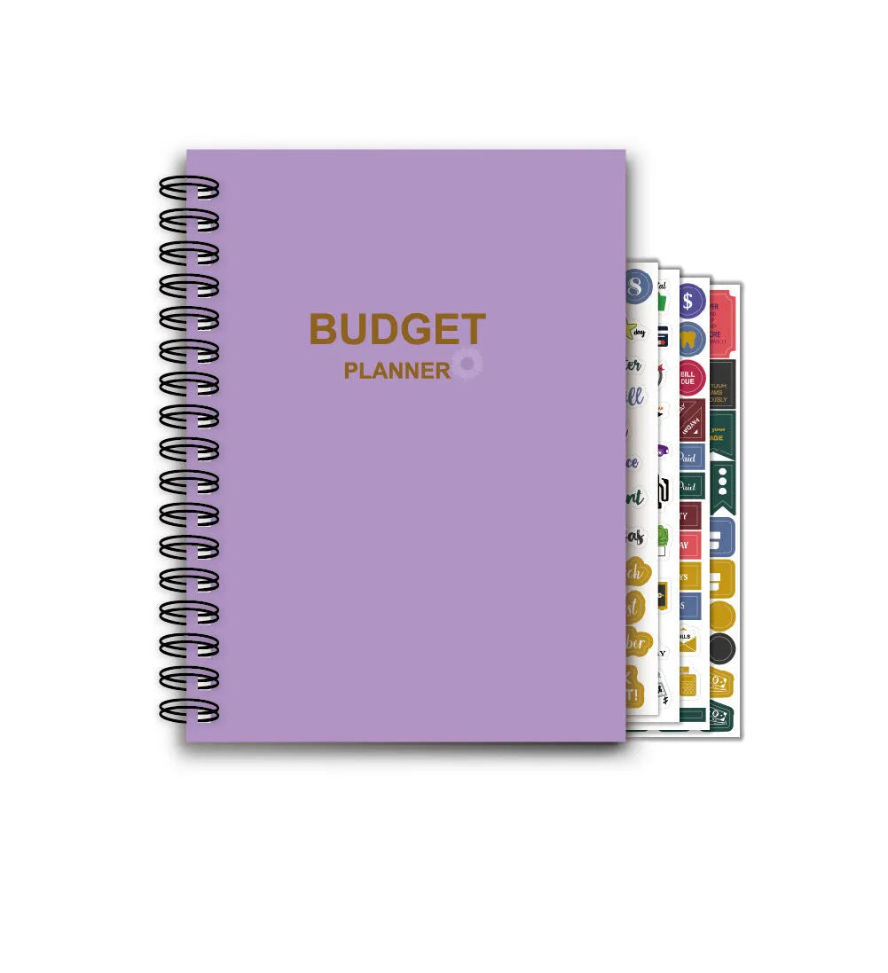 Purple coil-bound financial planning notebook with budget stickers and paper clips