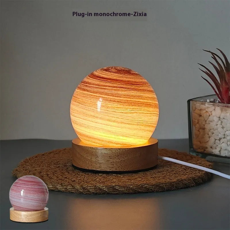 Planet-themed night light with USB cable and base, showing 80mm diameter globe