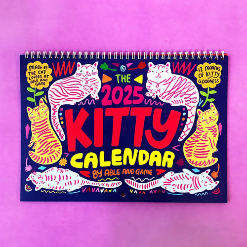 A portrait-format paper wall calendar featuring cat imagery, available for the 2024 or 2025 year.
