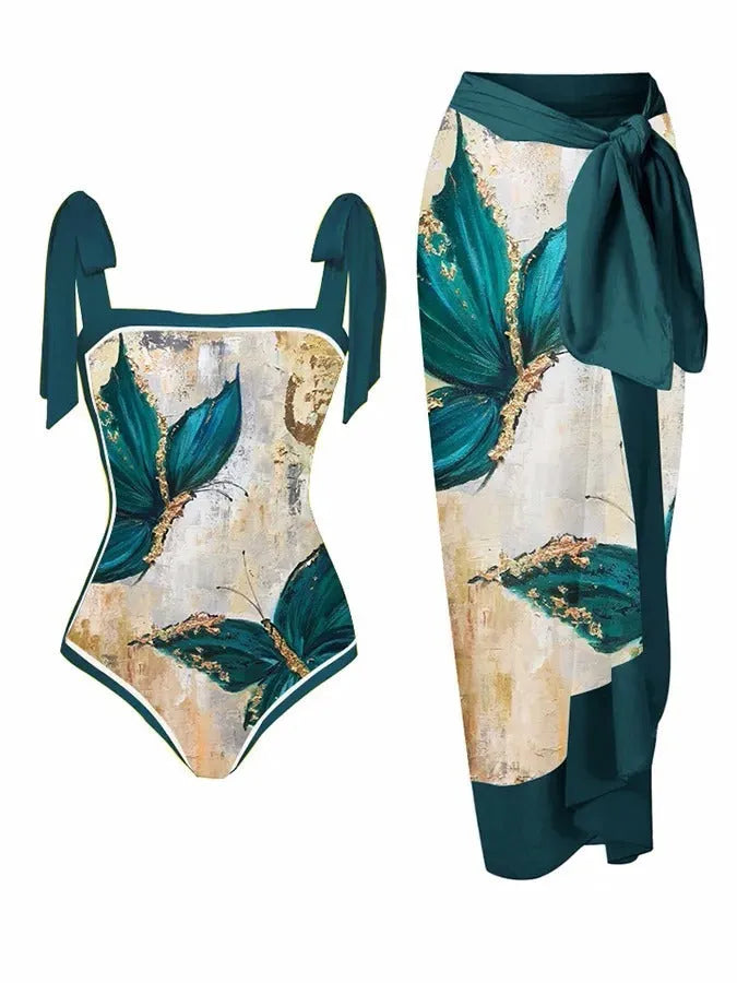Women's printed chiffon two-piece swimsuit set with a separate hip skirt.