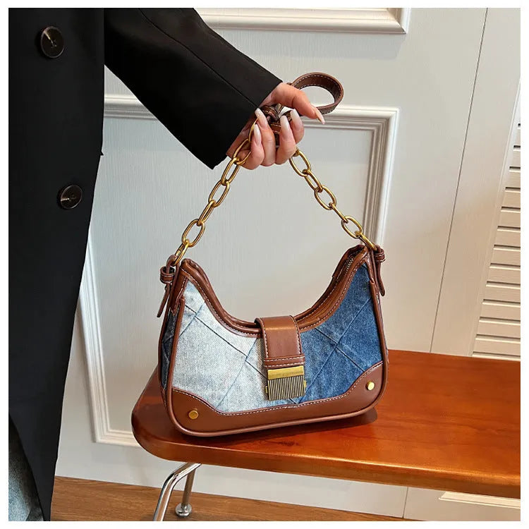 Brown denim women's bucket shoulder bag with diamond mesh pattern and chain detail