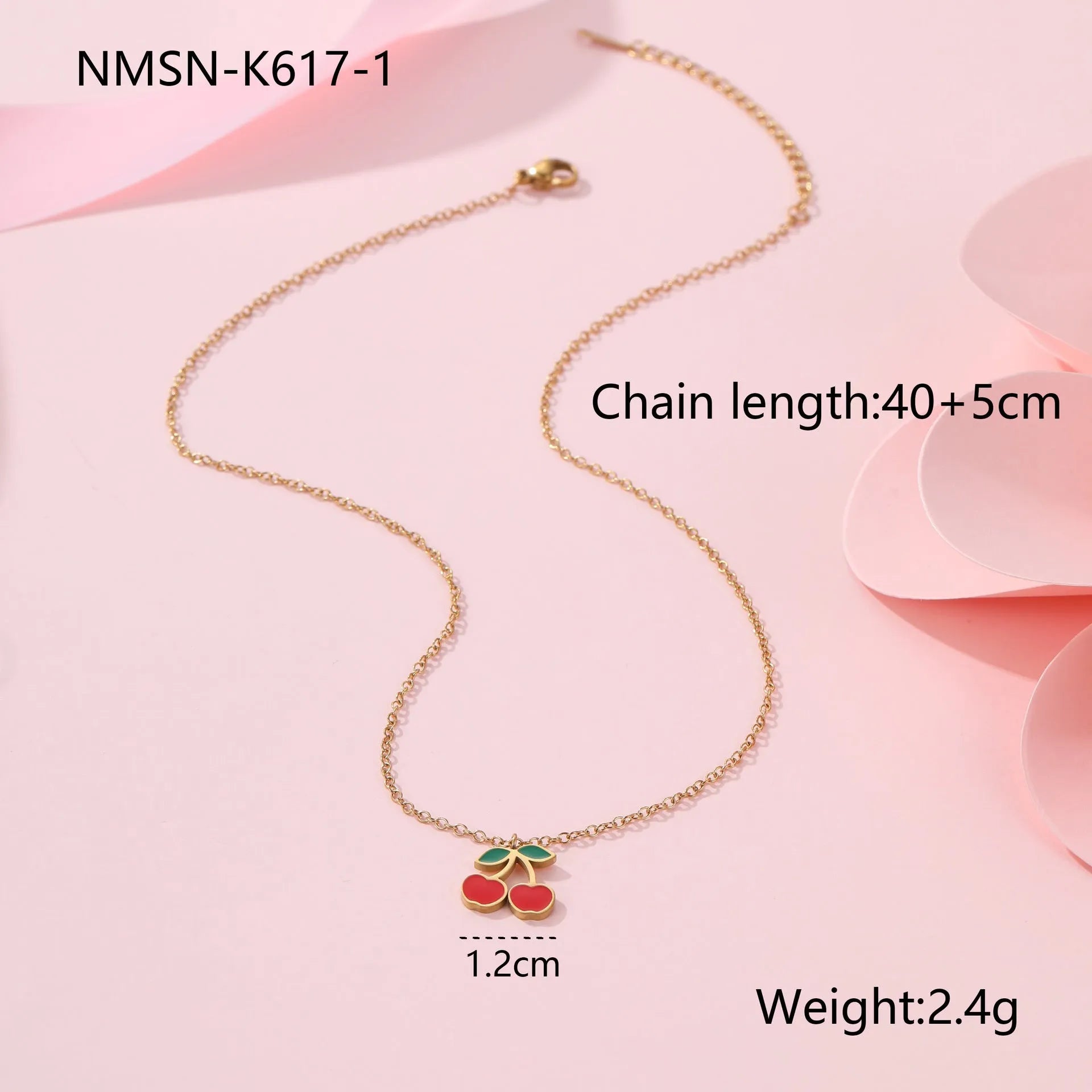 Cherry jewellery set showing necklace, bracelet, earrings, and ring with stainless steel construction and 18K gold electroplated finish