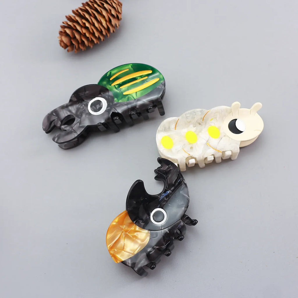 Handmade cellulose acetate Beetle Grip with cartoon caterpillar design