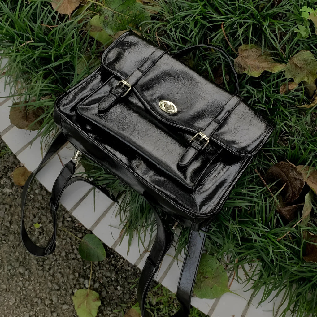 Black college style messenger bag for women with oil wax PU leather finish showing 35cm length dimensions