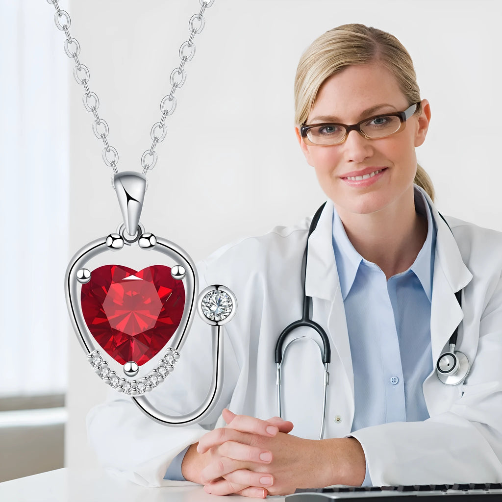 Women's red diamond stethoscope necklace with wings and cross motifs on copper chain