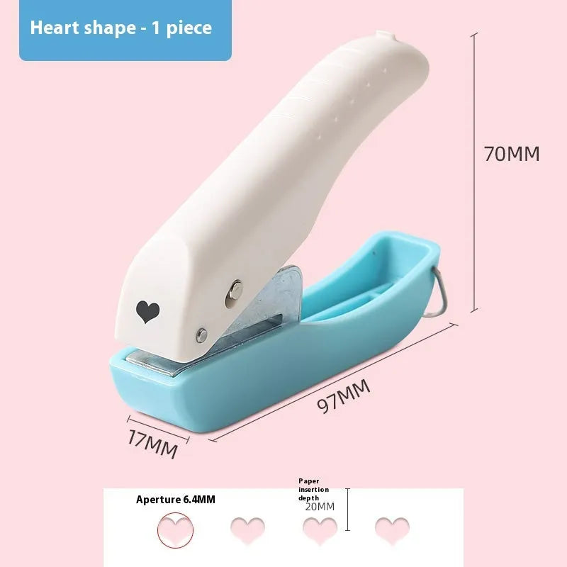Manual decorative paper punching machine with love, star, and round hole attachments
