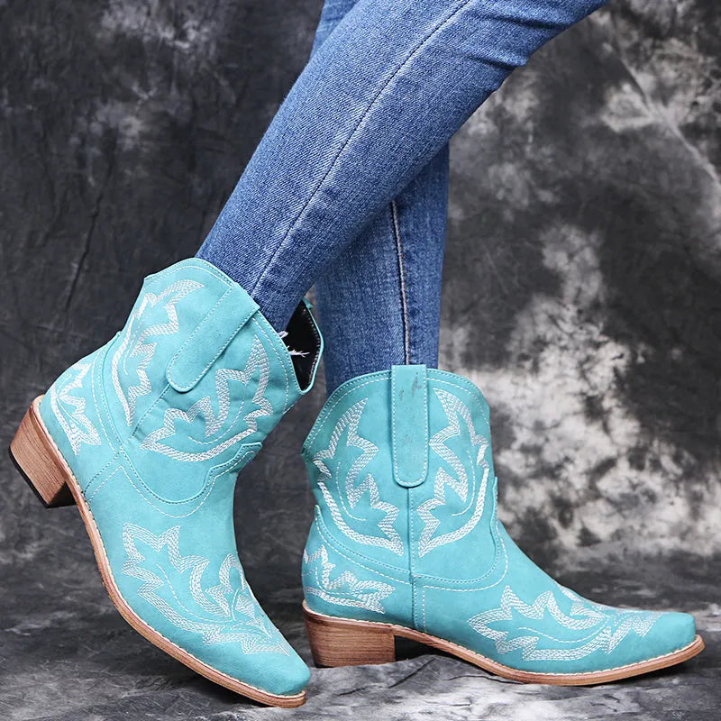Women's blue embroidered cowboy boots with a wedge heel and pointed toe