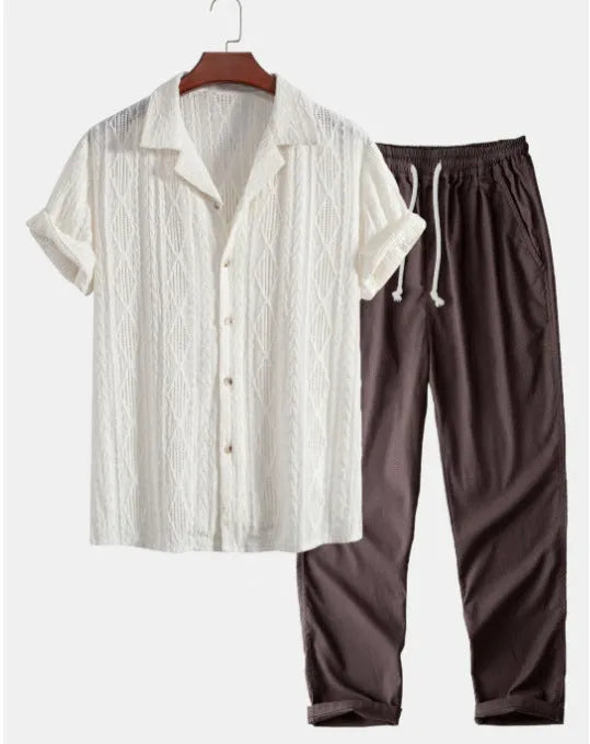 Men's camouflage print casual suit set with short-sleeve lapel shirt and trousers on a hanger.