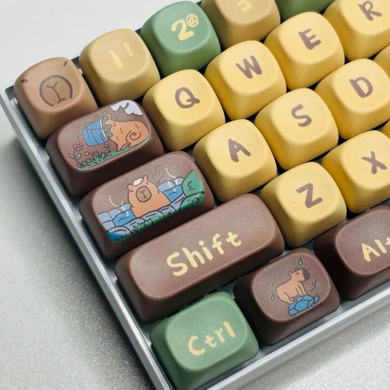 Capabala PBT mechanical keyboard keycap set showing 130 colourful keycaps with clear printed legends