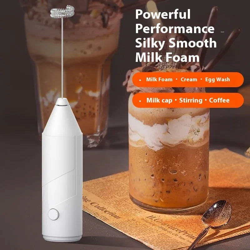 Mini handheld electric milk frother with stainless steel whisk and USB charging available in black white and khaki