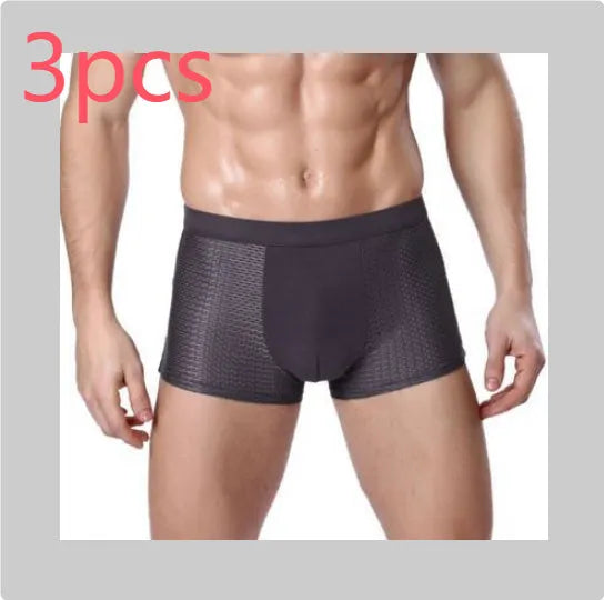 Men's solid colour modal boxer briefs with a U-convex design on a mid-waist.
