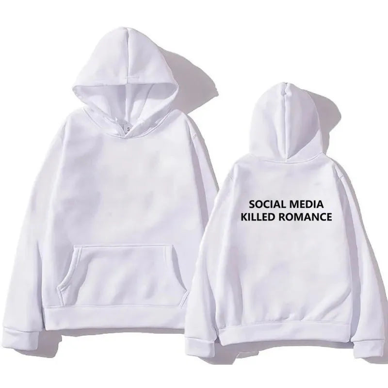 Man wearing a slim fit grey hoodie with a printed white spring letter pattern on the front.