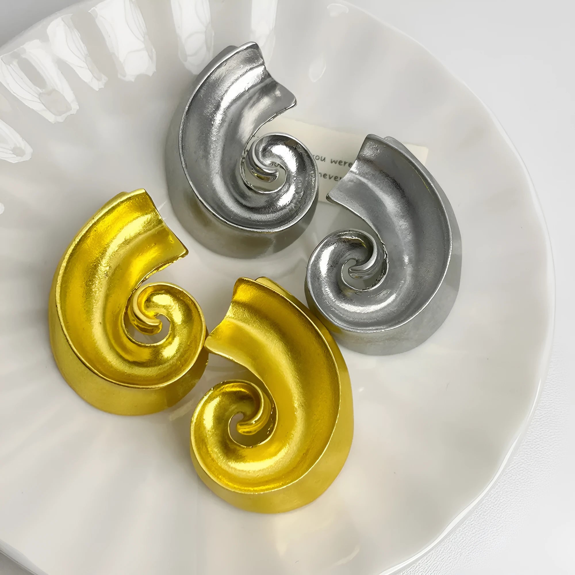 Geometric retro design alloy ear studs in gold or silver colour, 5cm size.