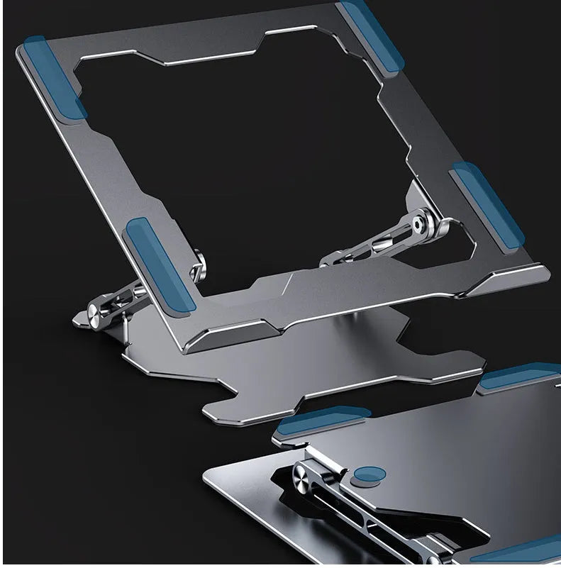 Grey aluminium folding laptop stand holding a silver laptop at an angle on a wooden desk.