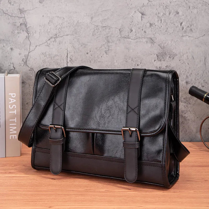 Black Korean-style men's backpack with anti-theft features and PU construction