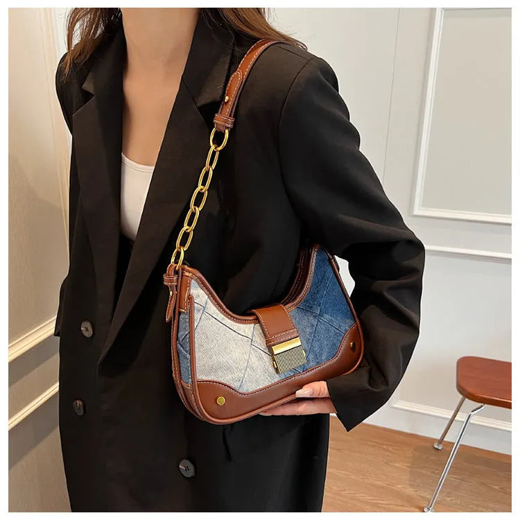 Brown denim women's bucket shoulder bag with diamond mesh pattern and chain detail
