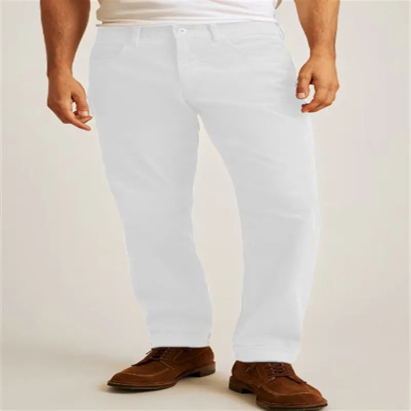Men's corduroy straight leg trousers in army green showing mid waist and zip fly detail
