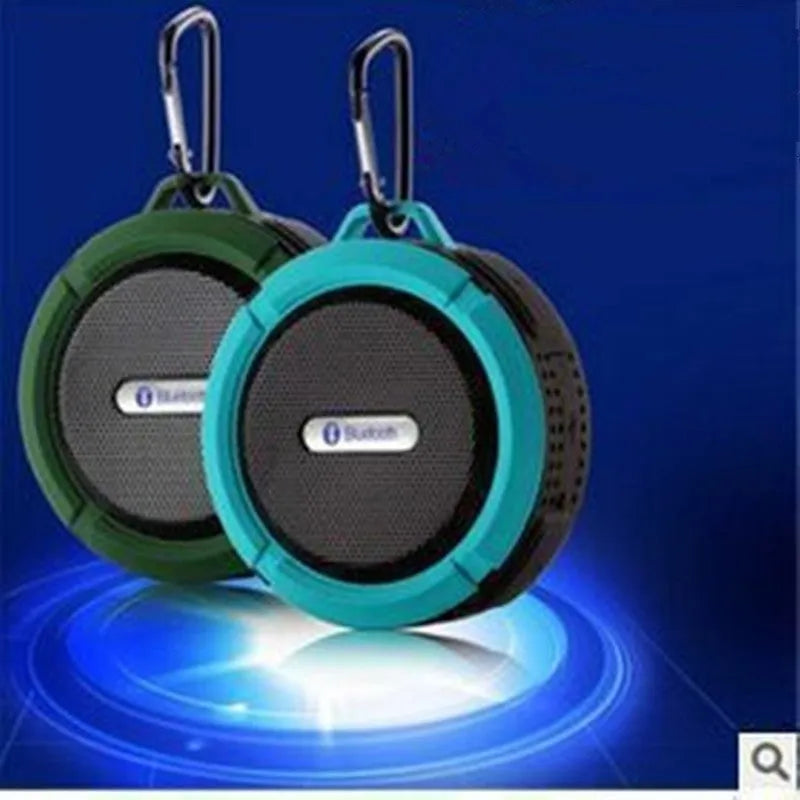 Portable waterproof Bluetooth speaker in five colours with bag clip and TF card slot