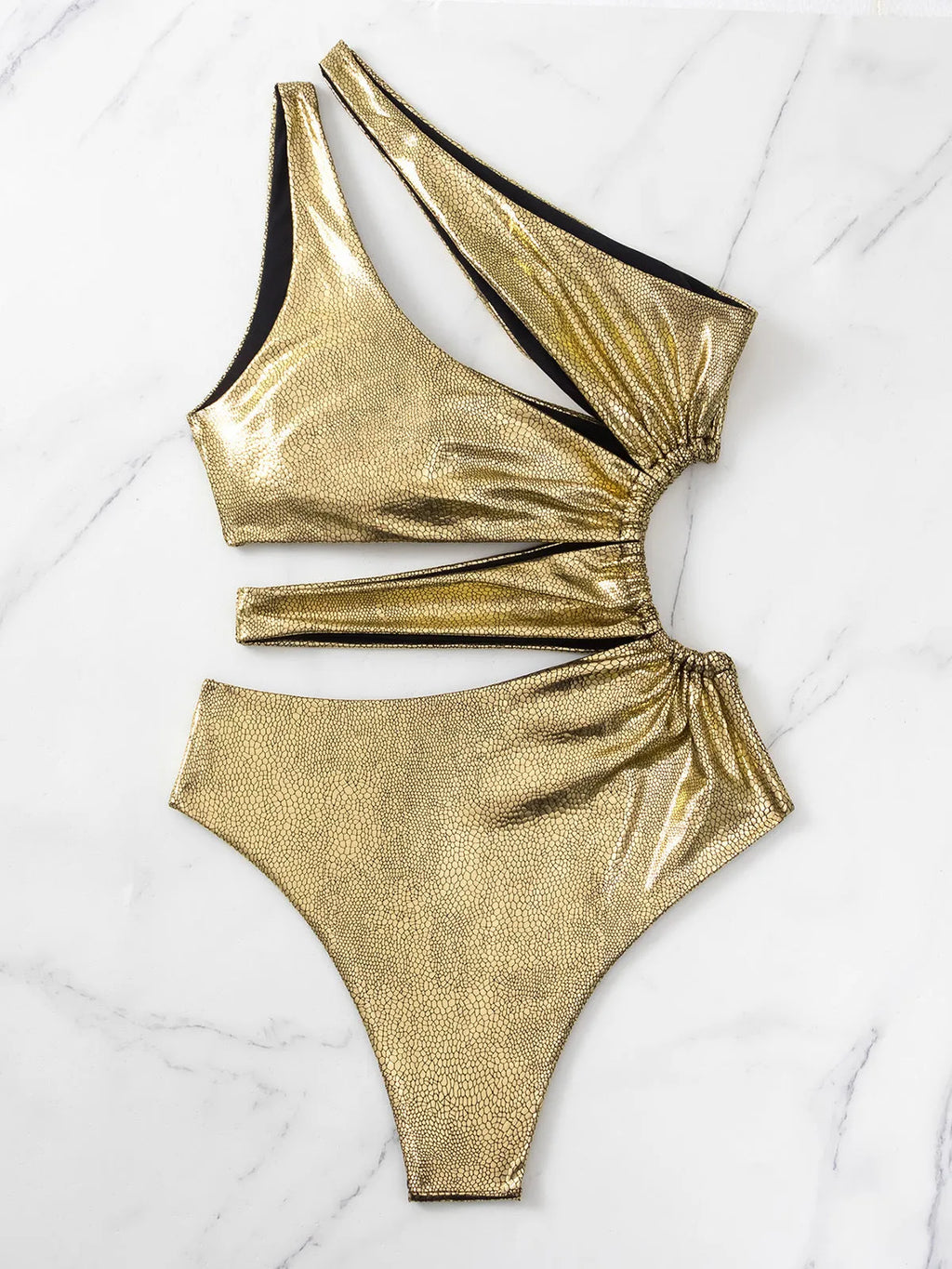Women's gold backless one-piece swimsuit on hanger showing spandex material and European American style
