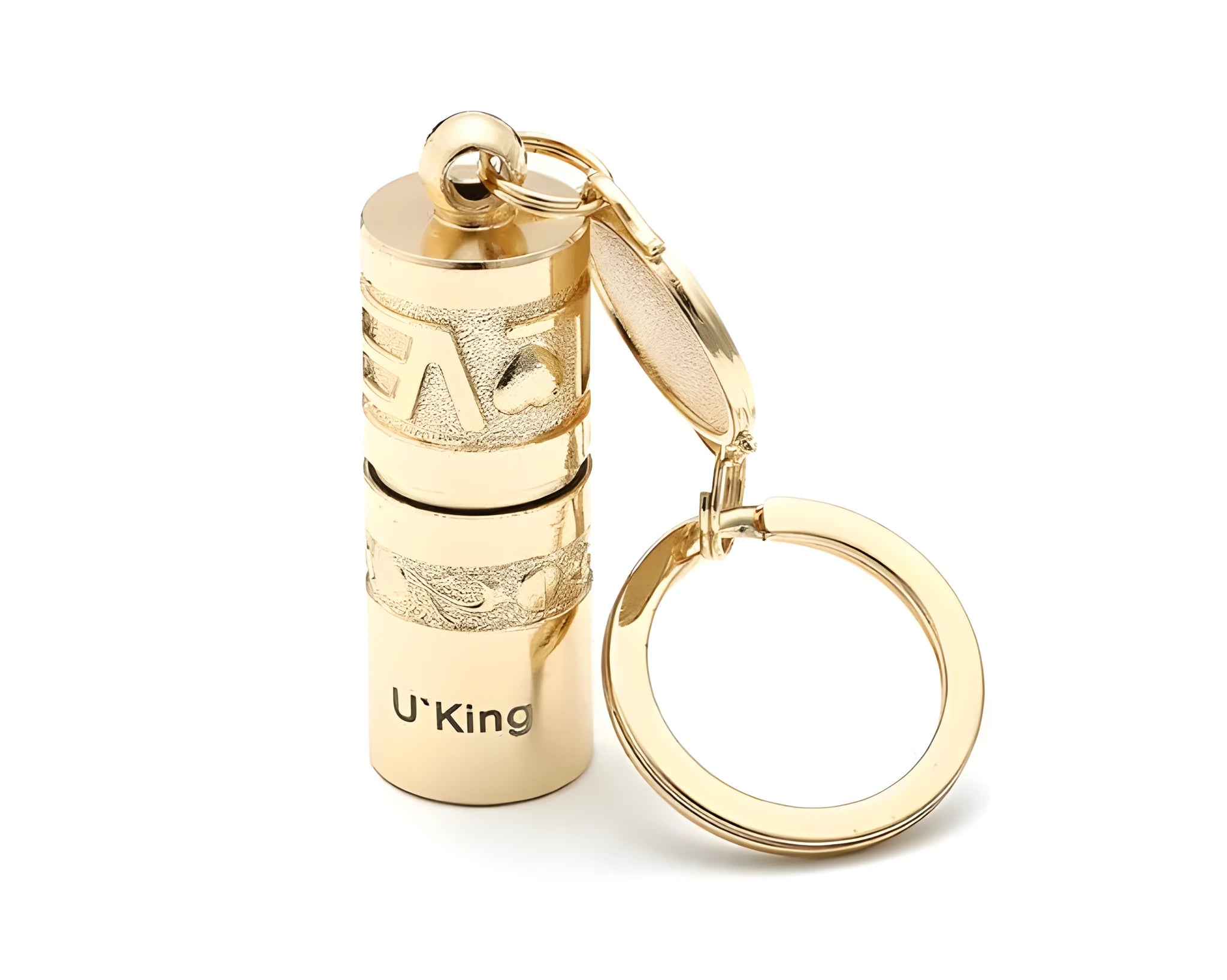Gold-coloured zinc alloy waterproof mini LED flashlight on a keychain.