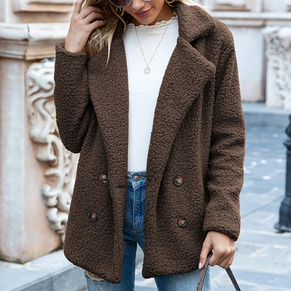 Women's fluffy loose lapel button coat in a range of colours on a size chart background.