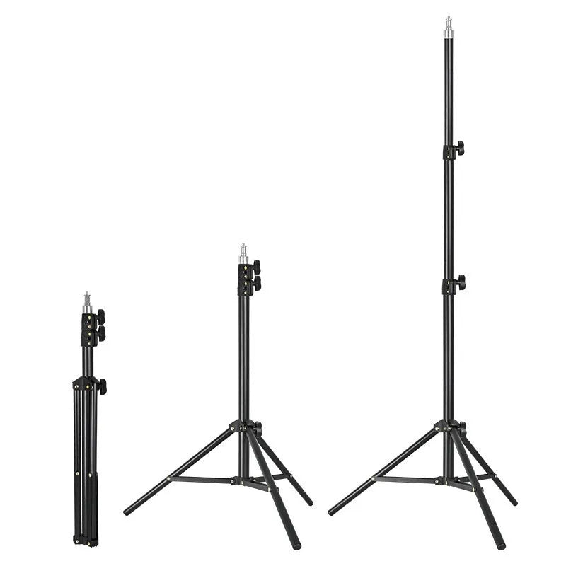 Tripod light stand with mobile phone holder showing adjustable height and frosted legs