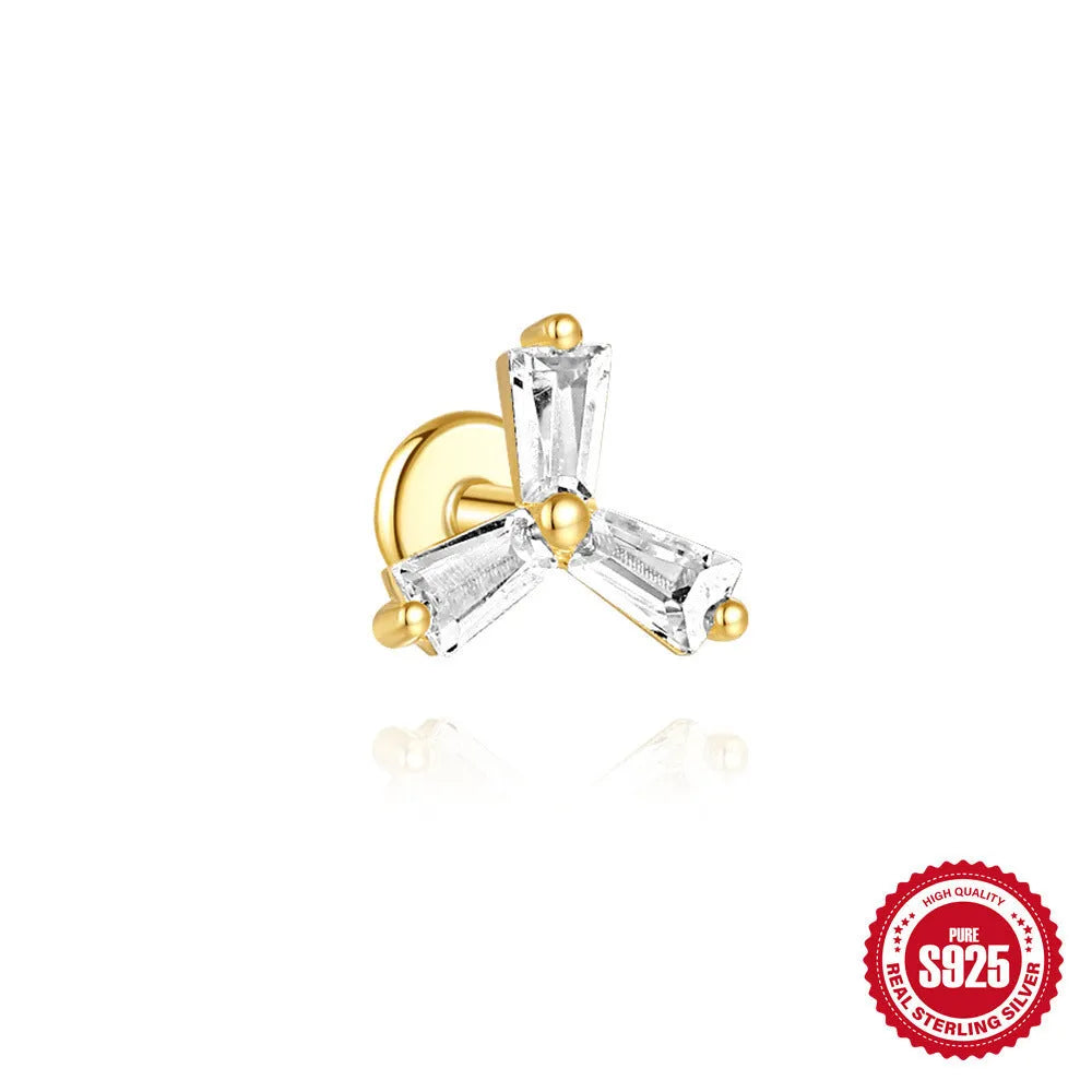 Close-up of a golden double ear piercings chain design stud earring made from S925 sterling silver with inlaid zircon stone.