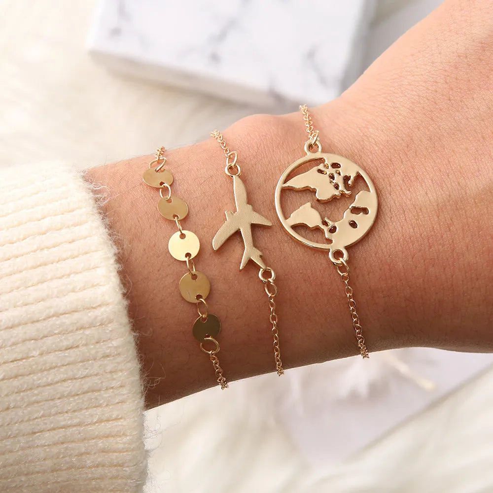 Women's bohemian style aircraft map charm bracelet set with three electroplated alloy pieces