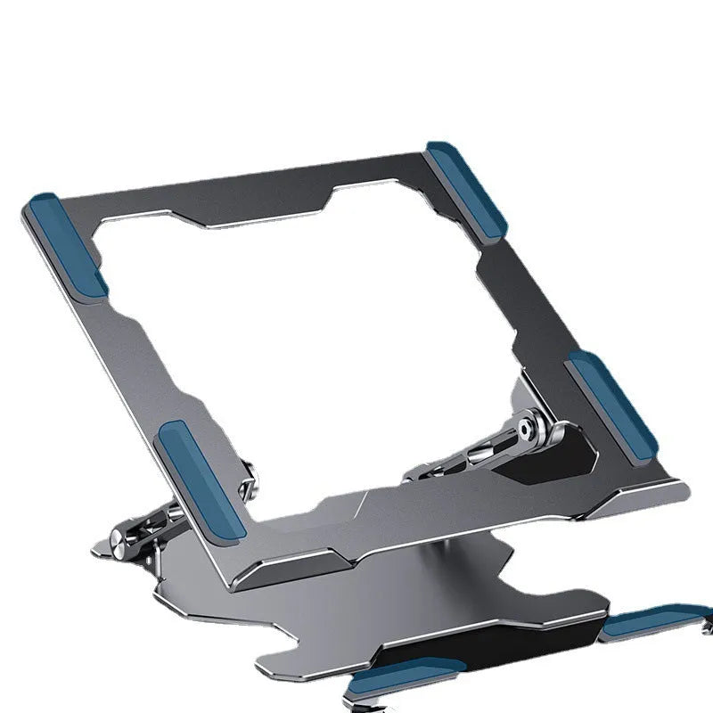 Grey aluminium folding laptop stand holding a silver laptop at an angle on a wooden desk.