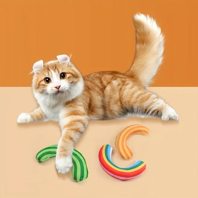 Striped pattern cat pillow measuring 23x20cm with noise toy and catnip elements in green, rainbow, or yellow colours
