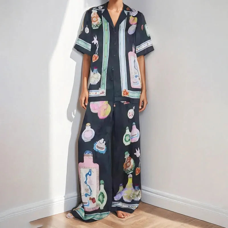 Black women's casual two-piece set with cartoon pattern cardigan and plain trousers