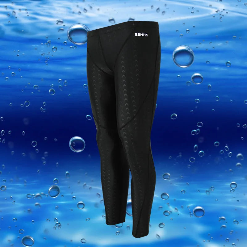 Men's nylon cropped swimming trunks in black with contrast line pattern for athletic swimming and fitness