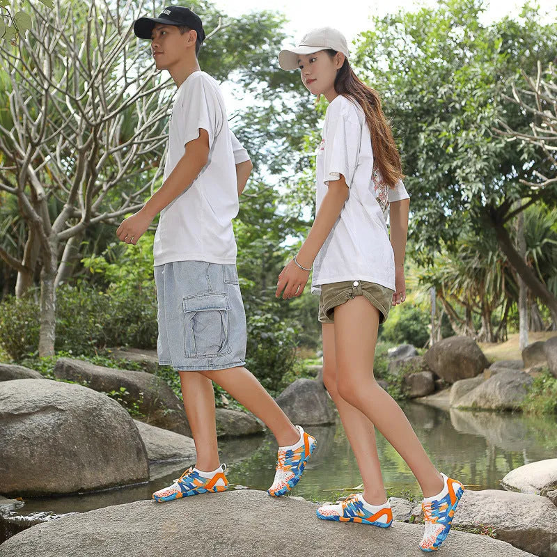 Men's and women's quick-drying mesh beach shoes in various colours with lace-up front and textured rubber sole.