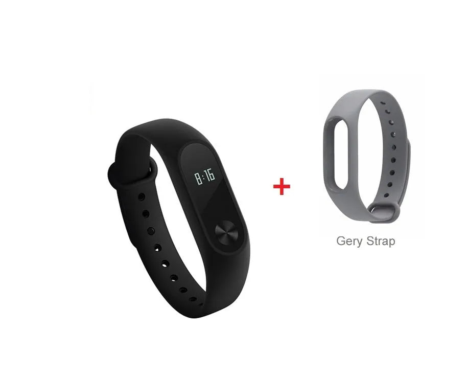 Black Xiaomi Mi Band 2 fitness tracker on wrist showing OLED display with heart rate data.